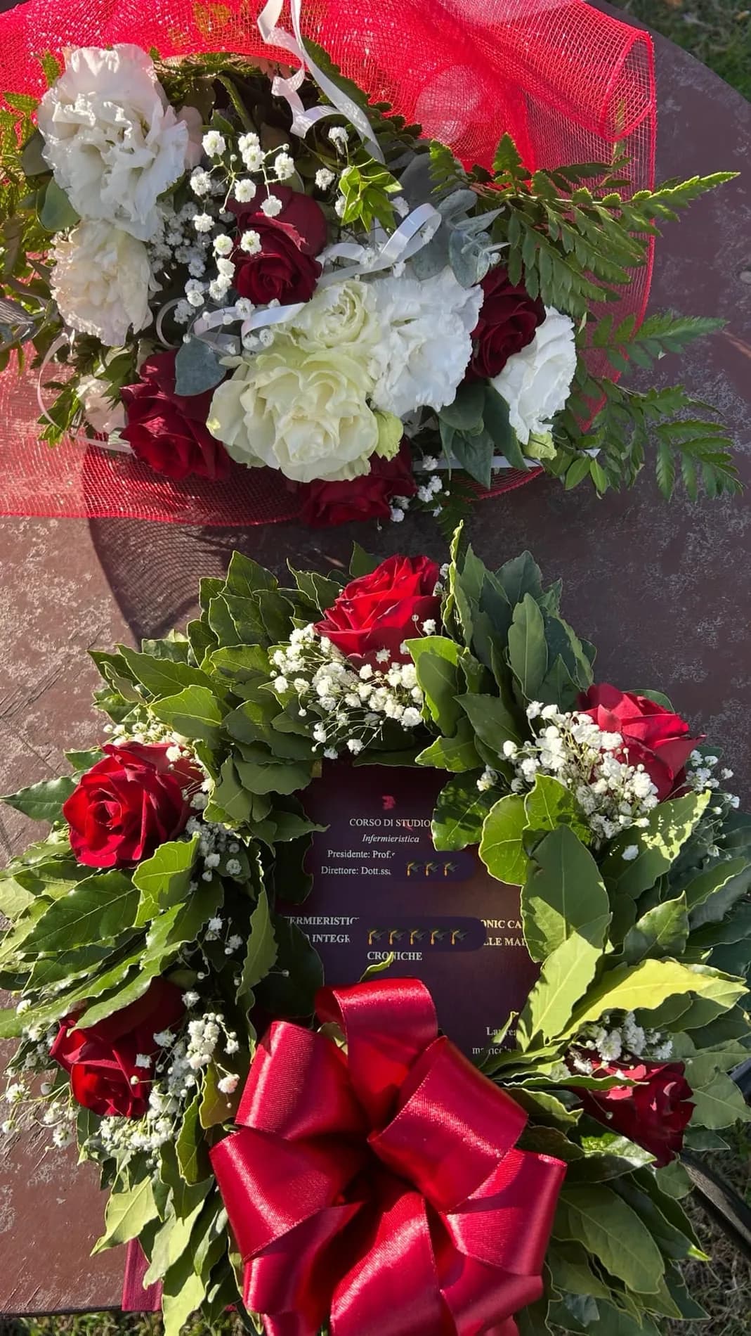 Bouquet e corona di laurea
